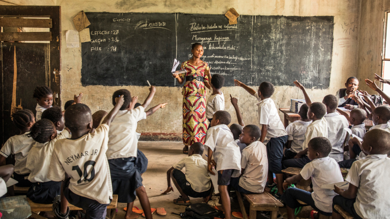 19 March 2020. Kananga, Democratic Republic of Congo. Kananga Educational Institute. A teacher gives class.